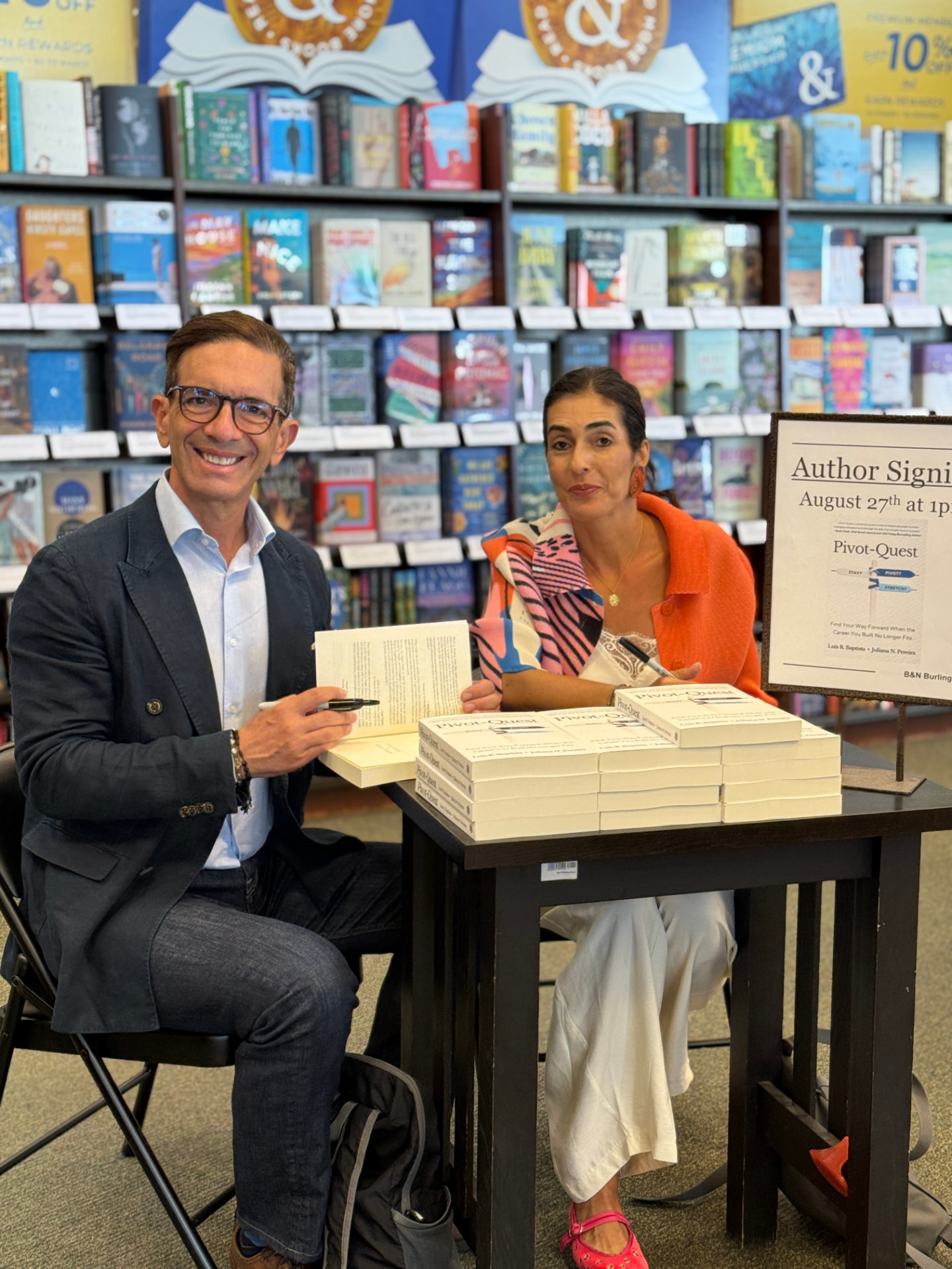 Luis Rodriguez Baptista and Juliana N. Pereira signing copies of Pivot-Quest at Barnes & Noble