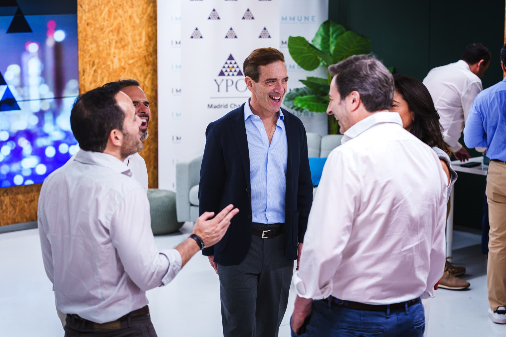 Luis Rodriguez Baptista with participants at a YPO Madrid event, with the YPO identity visible behind him